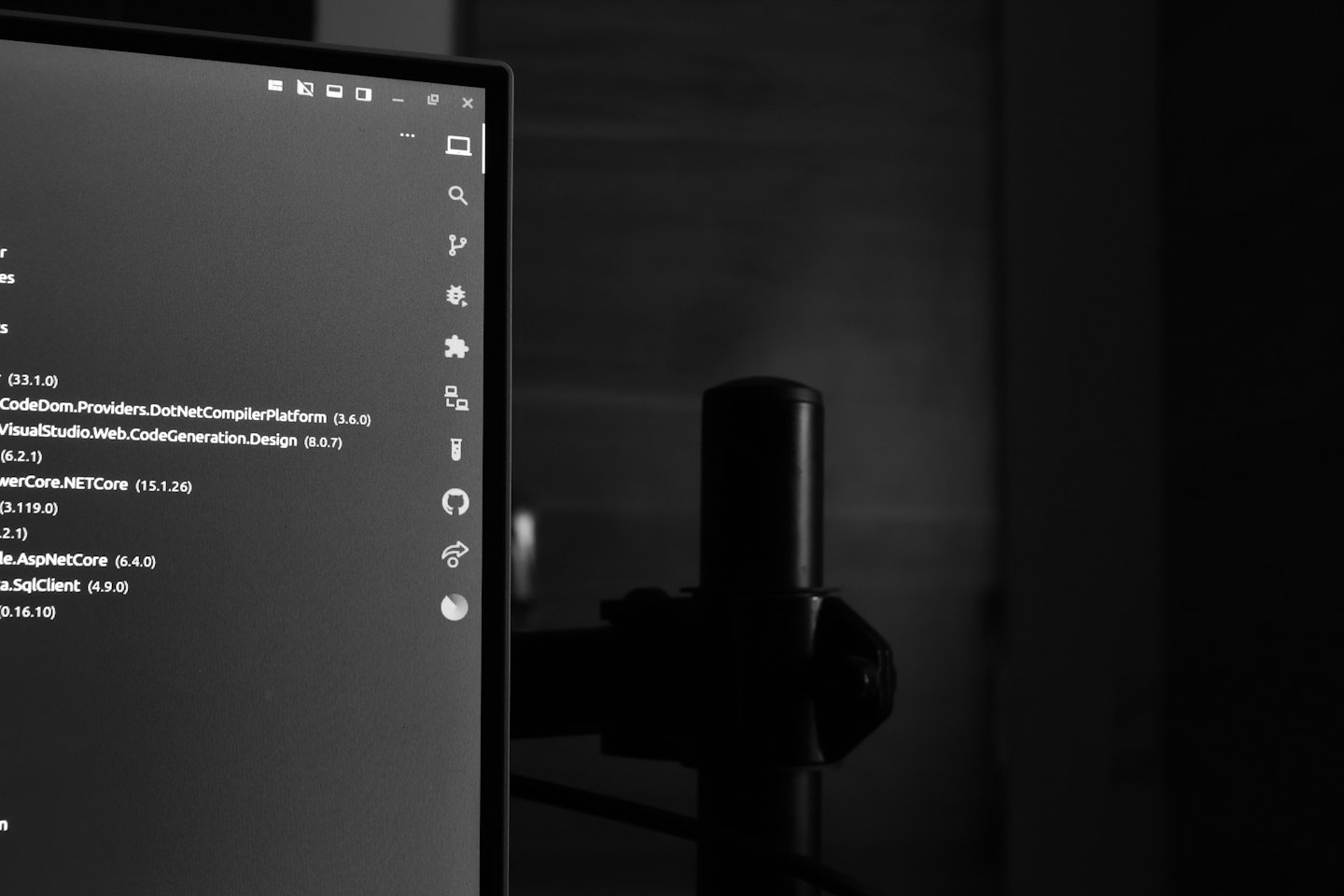 A computer monitor displays lines of code in a software environment.